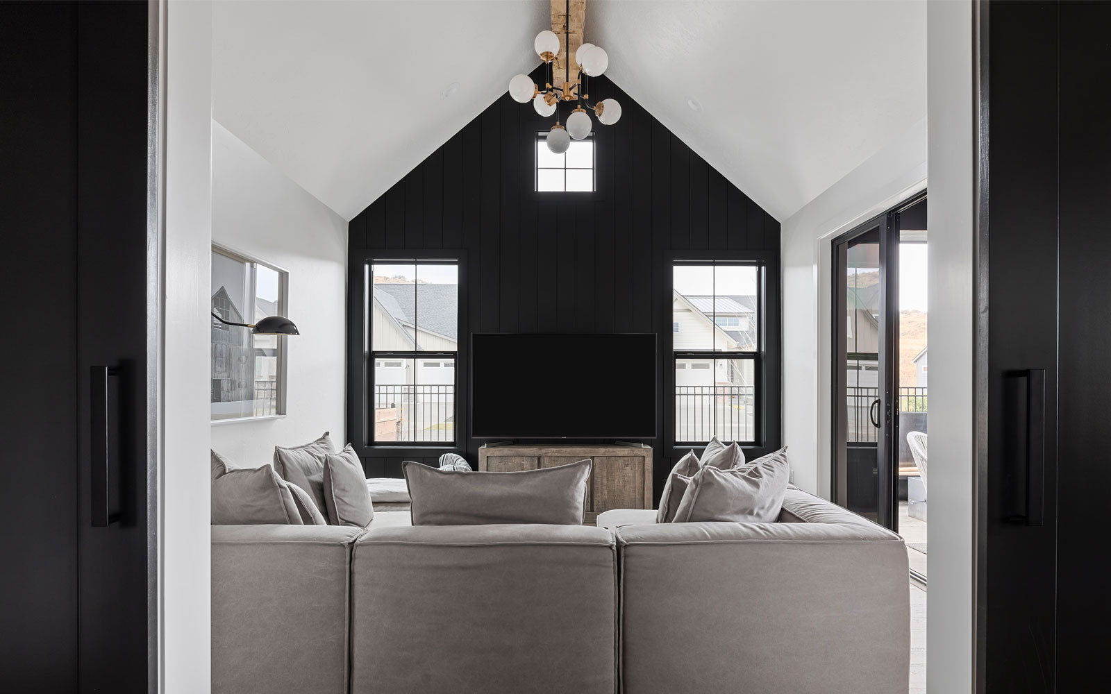 modern farmhouse home with black hardware accents and barn door from ageless iron