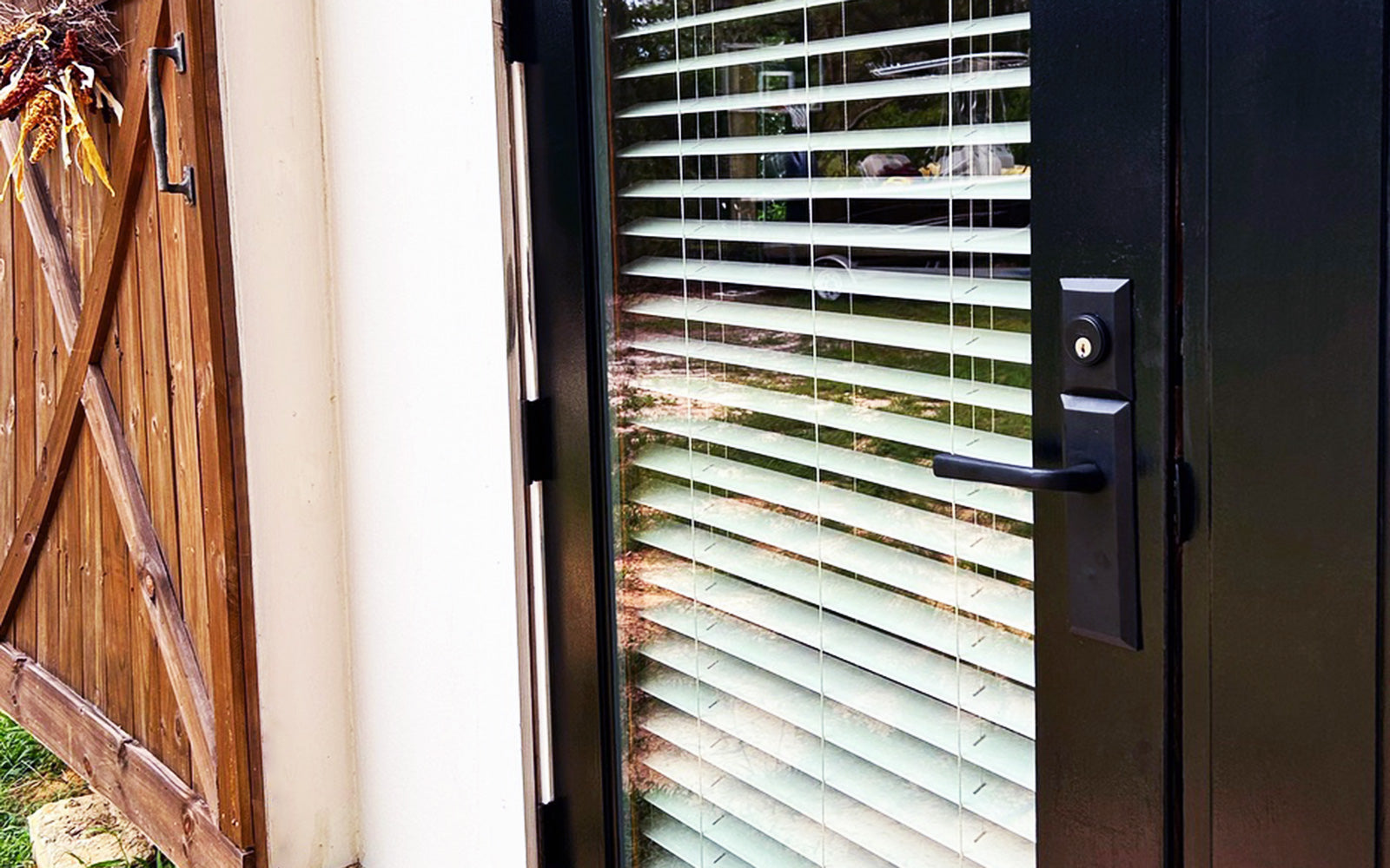 black glass patio door with modern farmhouse black door hardware from ageless iron