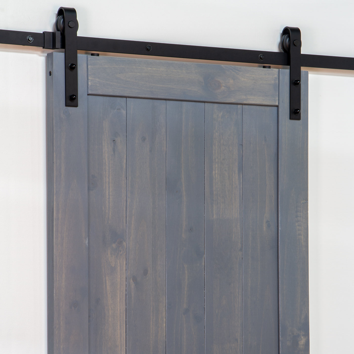 Ageless Iron matte black powder-coated steel barn door track and rollers